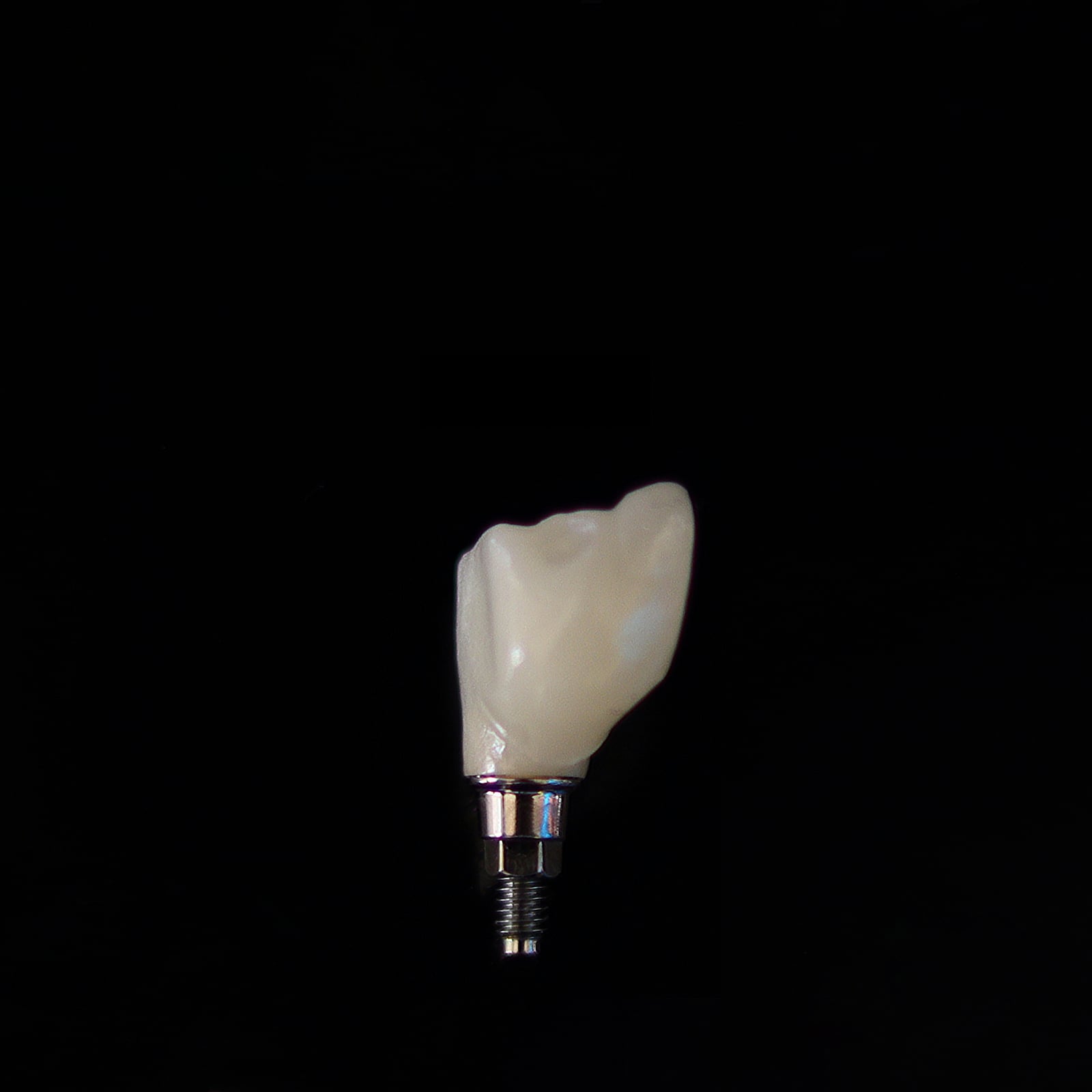 Ceramic implant crown on its titanium post